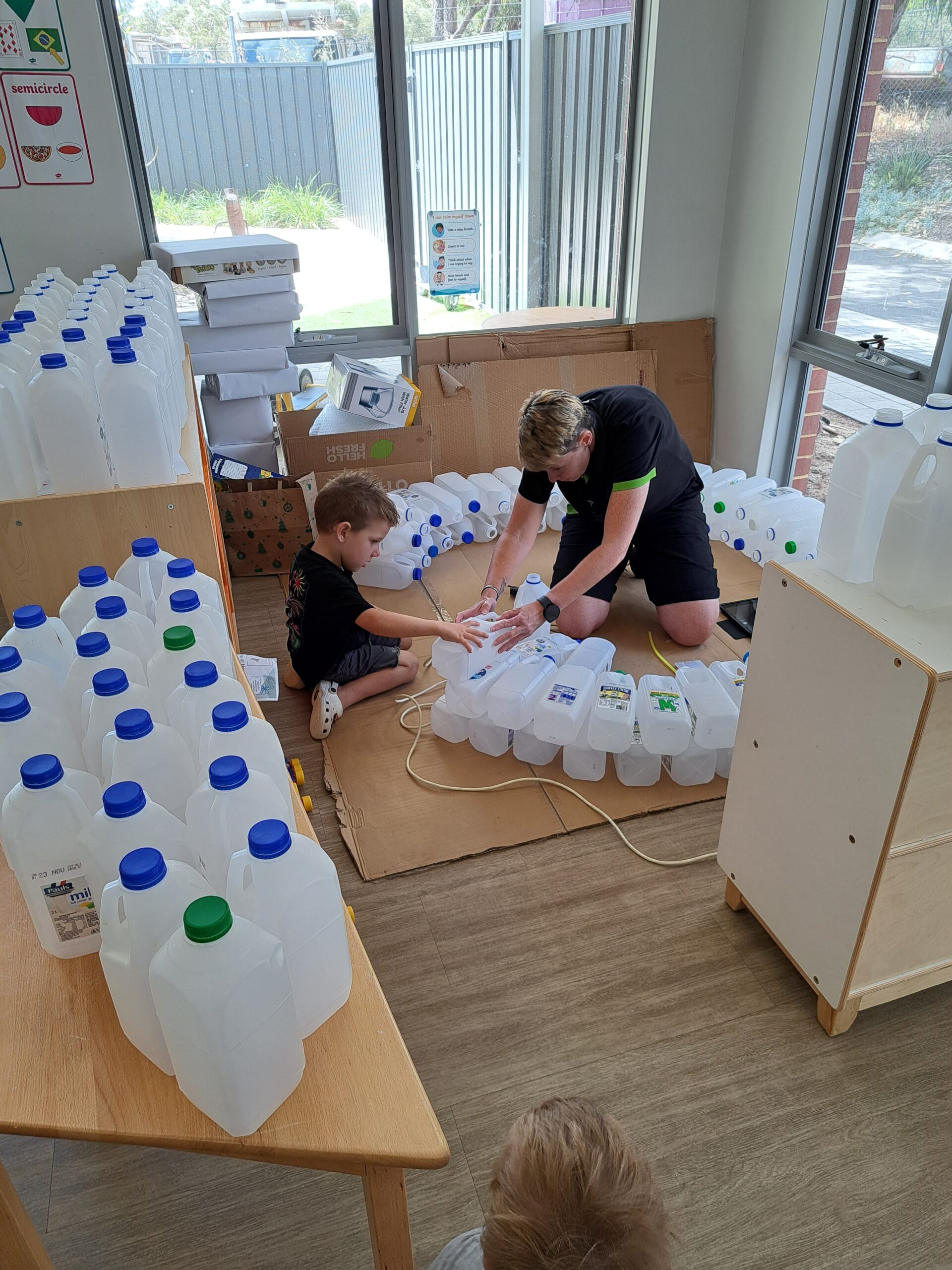 Educator Michelle And Archie Building Igloo