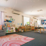 Bright learning space with reading corner and activity zones at East Cannington childcare centre