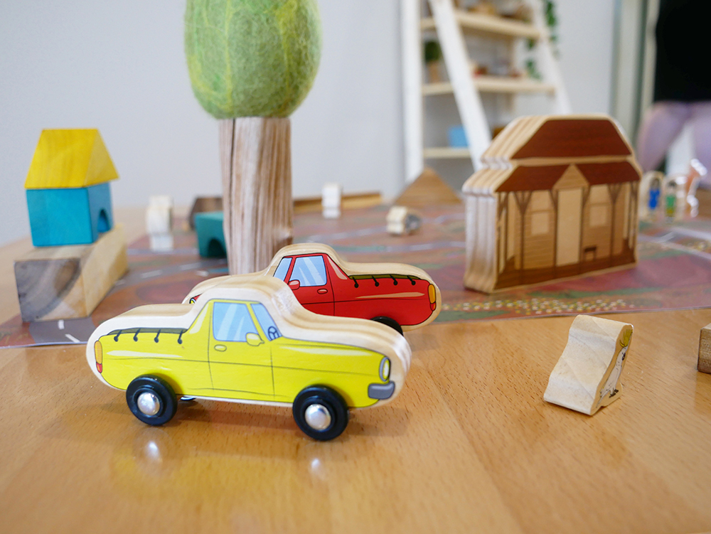 Wooden cars, houses and figurines on table at Port Hedland Early Learning Centre