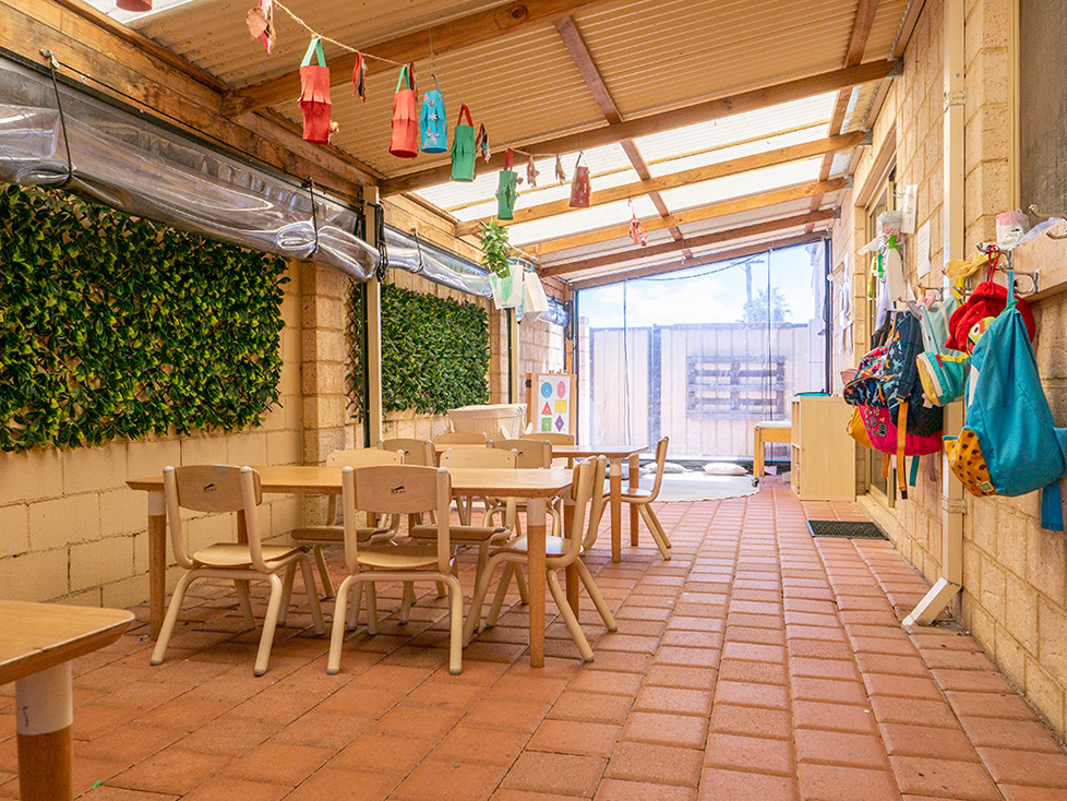 Outsider undercover area with tables and chairs at Westminster Early Learning Centre