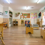 Childrens play room with toys and furniture at Westminster Early Learning Centre