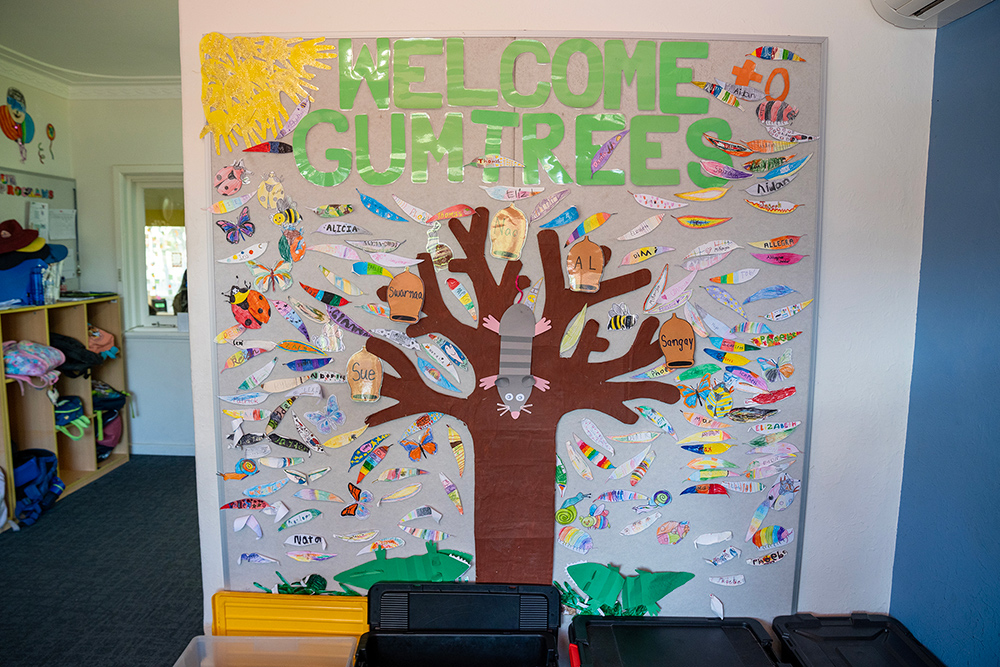 A colourful welcome sign at Gumtrees OSHC Service that is decorated with children’s names