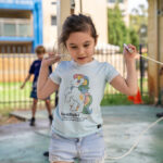 Child skipping outside during Gumtrees OSHC School Holiday Program