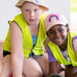 Children smiling at Mercy OSHC School Holiday Program