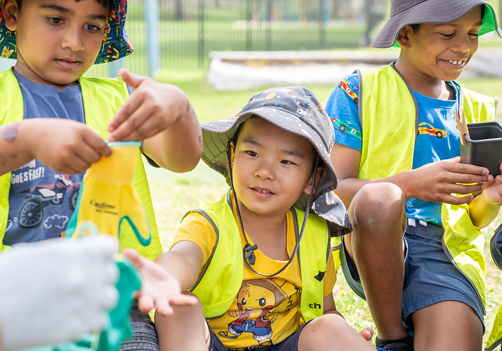Children during a gardening activity at Riverton OSHC School Holiday Program