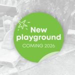 A promotional graphic announcing a new playground coming in 2026, overlaid on a greyscale photo of an existing children's play area