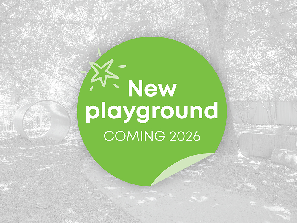A promotional graphic announcing a new playground coming in 2026, overlaid on a greyscale photo of an existing children's play area