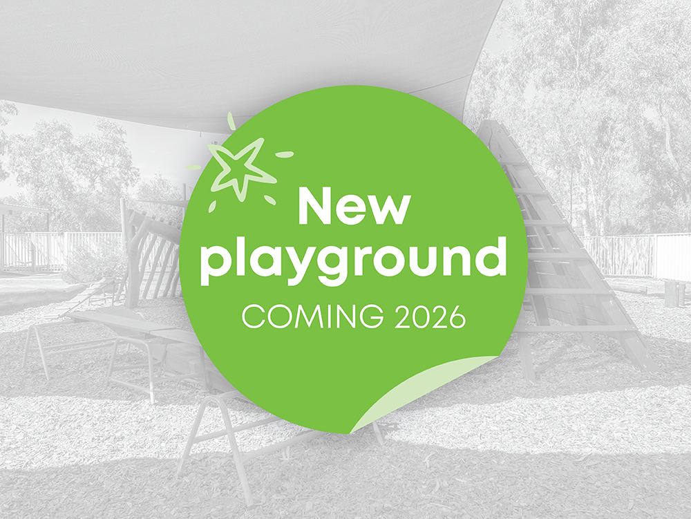 A promotional graphic announcing a new playground coming in 2026, overlaid on a greyscale photo of an existing children's play area