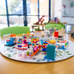 Close up image of Lego built on a table at an early learning centre
