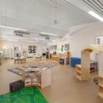 Childrens play room with age appropriate furniture and toys