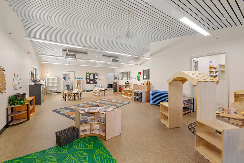 Childrens play room with age appropriate furniture and toys