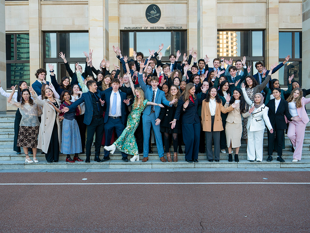 Group of excited young people out the front of the Parliament of Western Australian after engaging in the Youth Parliament program
