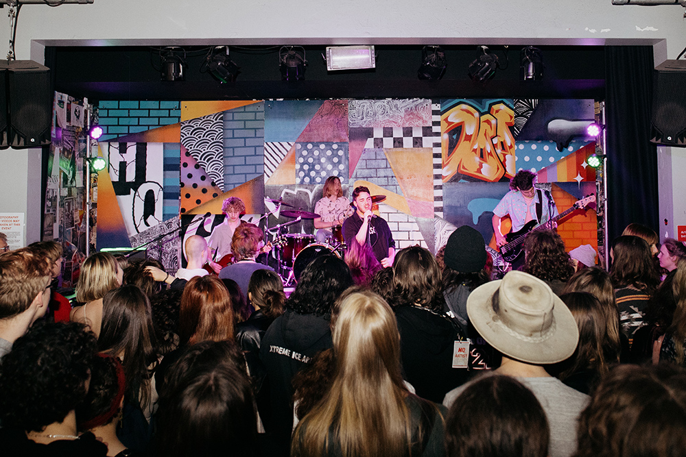 Band performing infront of crowd at the Y HQ in Leederville