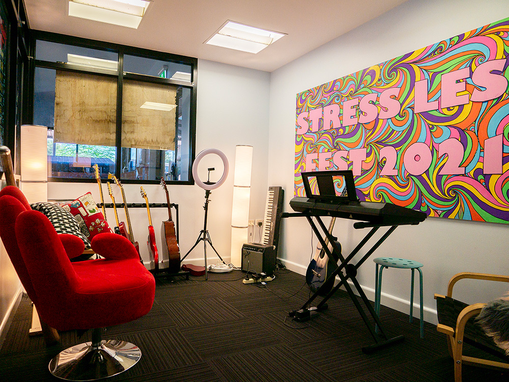 Music room at youth centre with keyboard, guitar and amp
