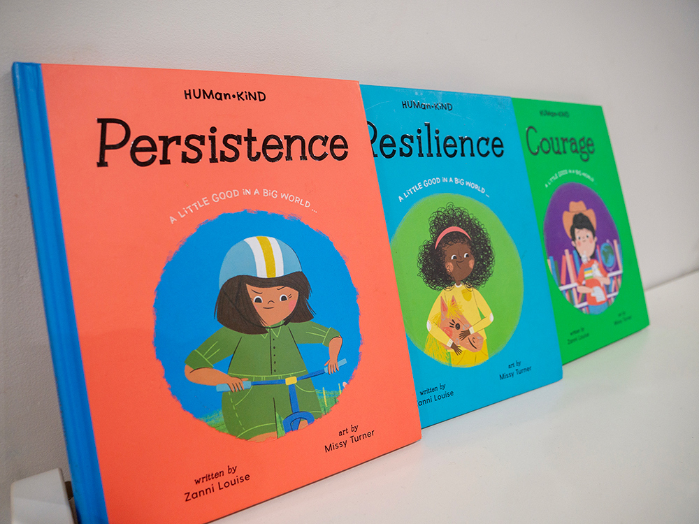 Three children's books on character values Persistence Resilience and Courage displayed at OSHC