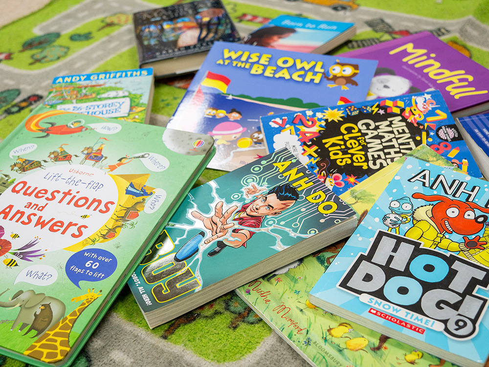 Diverse collection of children's books including Anh Do and Andy Griffiths titles at OSHC
