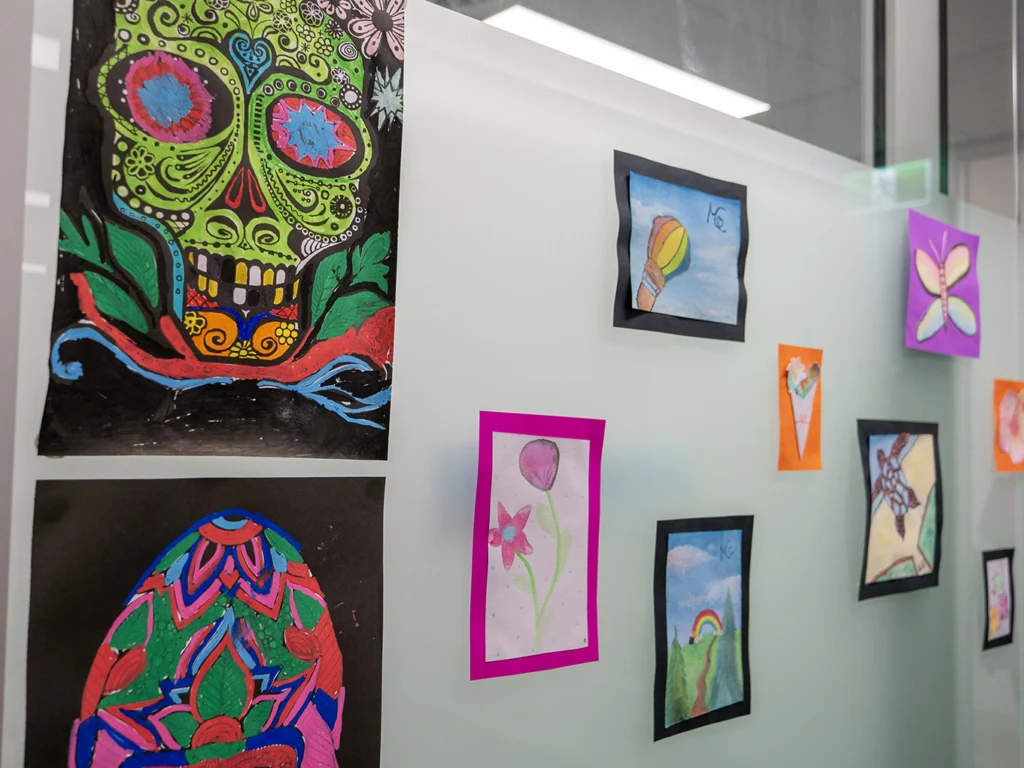 Colourful and vibrant artwork on display in a classroom at the Y Mirrabooka Junior School Campus