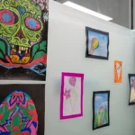 Colourful and vibrant artwork on display in a classroom at the Y Mirrabooka Junior School Campus