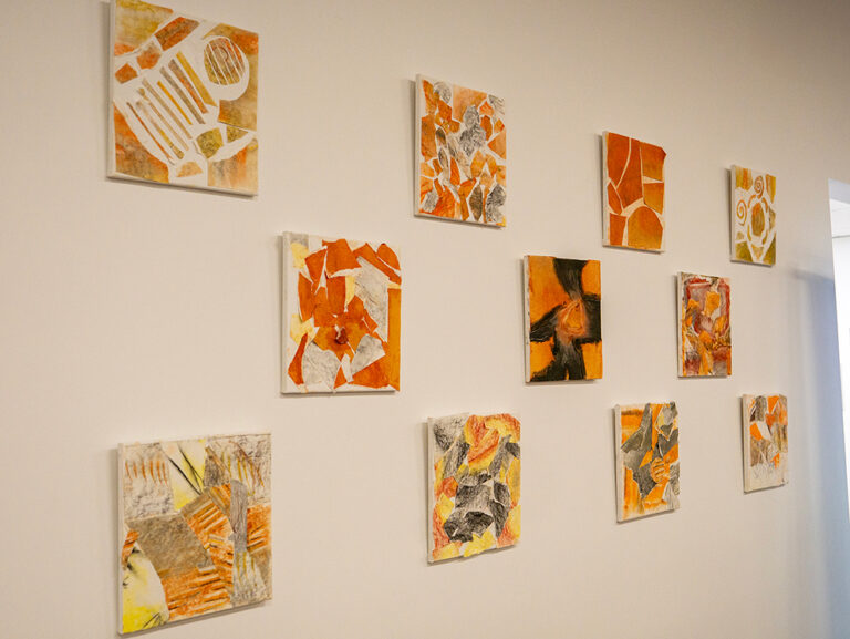 Student artwork displayed on a wall at the Y School Mirrabooka campus
