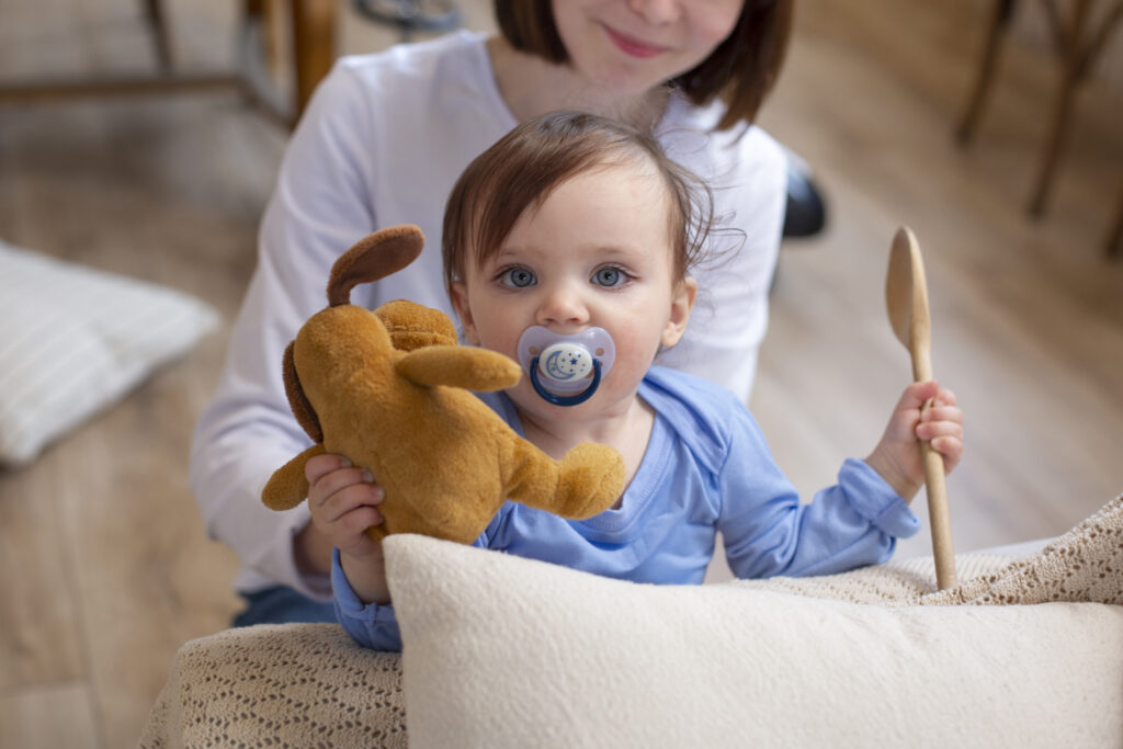 Close up image of woman holding baby