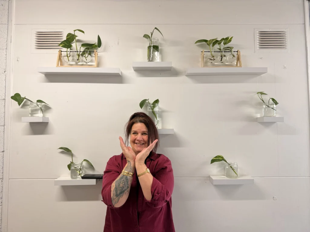 Kal Rec Centre Manager, Leah Stuart-Douglas posing infront of white wall